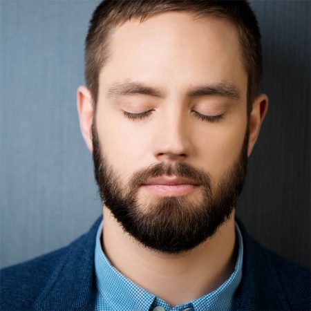 Young man, very peaceful, meditating