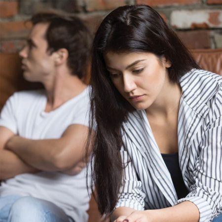 Young woman and man resolving a difficulty in relationship