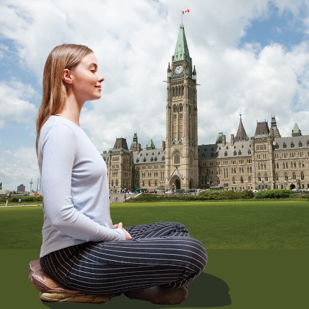 Woman meditating on Parliament Hill
